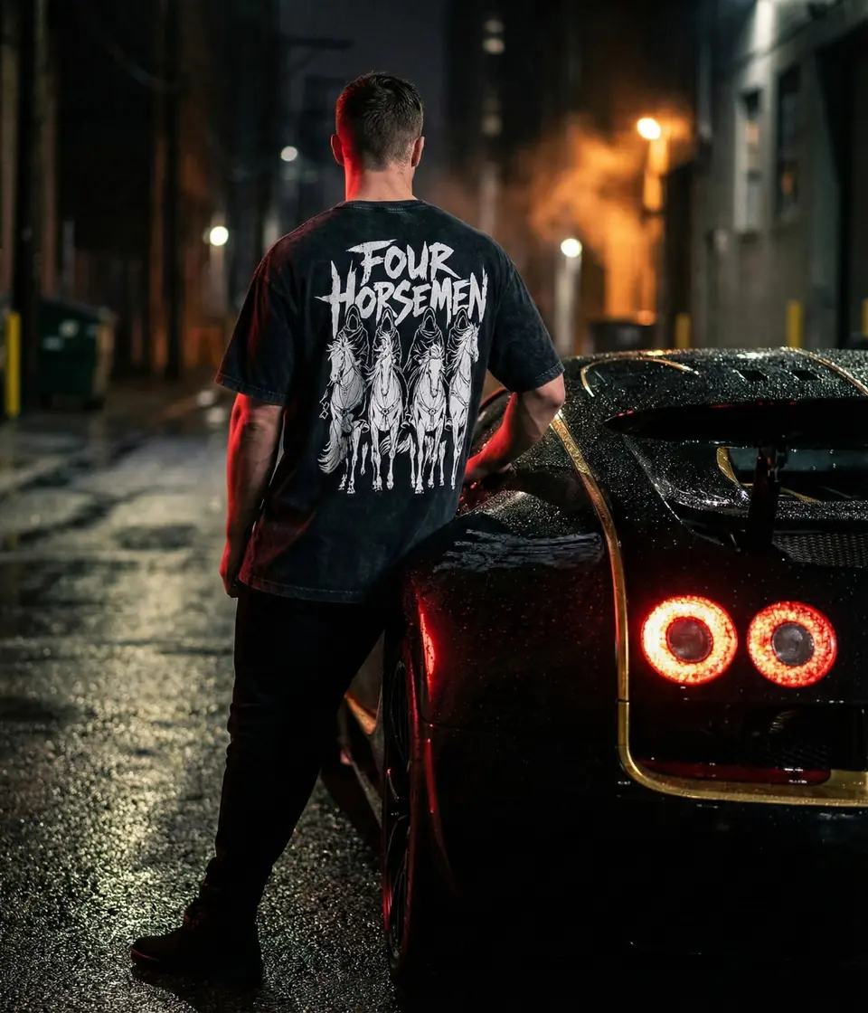 Four Horsemen tee on a night rooftop